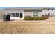 Paved patio and grill with view of the home's screened-in porch at 463 Kerriann Ln, Clayton, NC 27520