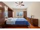 Cozy bedroom with wood floors, fan, and closet at 463 Kerriann Ln, Clayton, NC 27520