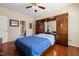 Spacious bedroom boasts hardwood floors, a ceiling fan, and ample closet space at 463 Kerriann Ln, Clayton, NC 27520