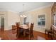Bright dining room with hardwood floors and sliding doors to a patio at 463 Kerriann Ln, Clayton, NC 27520