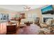 Bright and airy living room boasts hardwood floors, a fireplace, and ample seating at 463 Kerriann Ln, Clayton, NC 27520