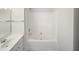 Clean bathroom featuring a tub/shower combo, vanity, and ample space at 4842 Wyatt Brook Way, Raleigh, NC 27609