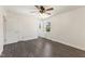 Empty bedroom with ceiling fan and doors on either side at 5304 Partridge St, Durham, NC 27704