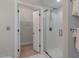 Modern bathroom showcasing a glass-enclosed shower and an adjacent walk-in closet at 534 Ives Ct, Chapel Hill, NC 27514