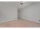 Cozy bedroom with neutral walls, carpet flooring, and a ceiling fan at 534 Ives Ct, Chapel Hill, NC 27514