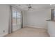 Bedroom with a large window offering natural light, neutral walls, carpet flooring and ceiling fan at 534 Ives Ct, Chapel Hill, NC 27514