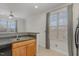 Kitchen area featuring wood cabinets, stainless steel sink, and natural light from the window at 534 Ives Ct, Chapel Hill, NC 27514