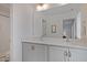 Bright and airy bathroom with double sinks, ample counter space, and a large mirror reflecting the room at 662 Vine Pkwy, Pittsboro, NC 27312