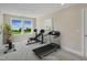 Home gym with treadmill, weights, and stationary bike, perfect for staying active at home at 69 Alex Farm Ct # 21, Zebulon, NC 27597