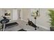 Home gym featuring a treadmill and stationary bike, offering convenience for workouts at 69 Alex Farm Ct # 21, Zebulon, NC 27597