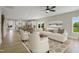 Spacious living room with hardwood floors, a comfortable sofa, stylish chairs, and plenty of natural light at 69 Alex Farm Ct # 21, Zebulon, NC 27597