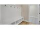 Bright mudroom boasts a built-in bench with cubbies and a coat rack, providing organized storage at 69 Alex Farm Ct # 21, Zebulon, NC 27597