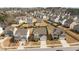 Neighborhood aerial showcasing well-maintained homes and landscaping at 717 Tailrace Falls Ct, Wake Forest, NC 27587