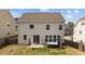 Backyard with a patio, hot tub, and ample space for outdoor activities and relaxation at 717 Tailrace Falls Ct, Wake Forest, NC 27587