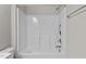 Shower and tub combo with gray walls at 717 Tailrace Falls Ct, Wake Forest, NC 27587