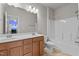 Bathroom with double vanity, tile flooring, and a shower at 717 Tailrace Falls Ct, Wake Forest, NC 27587