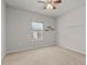 Bedroom with a window, carpet, and ceiling fan at 717 Tailrace Falls Ct, Wake Forest, NC 27587