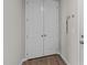Hallway closet with double doors and neutral decor at 717 Tailrace Falls Ct, Wake Forest, NC 27587