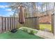 Cozy outdoor area featuring manicured turf and privacy fence for relaxed outdoor enjoyment at 7305 Sandy Creek Dr, Raleigh, NC 27615