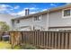 Rear exterior of the building with an enclosed patio space providing a cozy outdoor retreat at 7305 Sandy Creek Dr, Raleigh, NC 27615