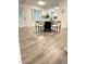 Contemporary dining area seamlessly connecting to a modern, updated kitchen at 1001 Atchison St, Garner, NC 27529