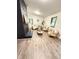 Bright living room with modern black fireplace and neutral decor, ideal for relaxation at 1001 Atchison St, Garner, NC 27529