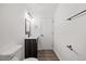 Well-lit bathroom showcasing a sleek vanity and fixtures, toilet, and neutral walls at 1001 Atchison St, Garner, NC 27529