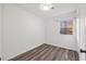 Cozy bedroom showcasing light-filled window and modern flooring that enhance the room's charm at 1001 Atchison St, Garner, NC 27529