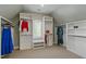 Spacious walk-in closet with built-in shelving and storage for ample organization at 1001 Welch Ln, Raleigh, NC 27614