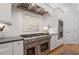A close up of the stainless steel oven and cooktop at 1001 Welch Ln, Raleigh, NC 27614