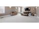 Spacious living room with neutral paint, recessed lighting, and plush carpeting at 1001 Welch Ln, Raleigh, NC 27614