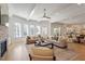 Spacious living area filled with natural light, featuring hardwood floors and stylish furnishings at 1001 Welch Ln, Raleigh, NC 27614