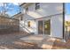 Exterior view of the house featuring a backyard and patio, perfect for relaxation and outdoor living at 1004 Helms Pl, Raleigh, NC 27610