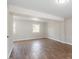 Finished basement with brick wall and tile floor at 1004 Helms Pl, Raleigh, NC 27610