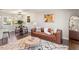 Cozy living room showcases modern decor, a comfortable sofa, and stylish rug for a welcoming ambiance at 1004 Helms Pl, Raleigh, NC 27610