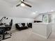 Versatile bonus room with neutral walls and lots of natural light at 101 Weatherly Pl, Cary, NC 27518