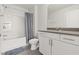 Clean bathroom featuring a shower-tub combo with white fixtures at 1019 Navigon Dr, Durham, NC 27713