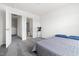 Small bedroom with ensuite bathroom and minimal furniture at 1019 Navigon Dr, Durham, NC 27713