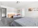Bright bedroom featuring neutral walls, gray carpet, and modern chaise lounge at 1019 Navigon Dr, Durham, NC 27713