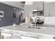 Close up on the kitchen island, light countertops and stainless steel faucet at 1019 Navigon Dr, Durham, NC 27713