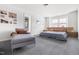 Large main bedroom with sitting area features a sleek platform bed and soft gray carpet at 1019 Navigon Dr, Durham, NC 27713