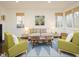 Inviting living room with neutral colors, stylish furniture, and an abundance of natural light at 104 Manchester Pl, Chapel Hill, NC 27516