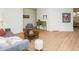 Spacious living room with a seating area, hardwood floors, and modern décor in a well-lit space at 104 Manchester Pl, Chapel Hill, NC 27516