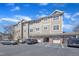 Inviting multi-story condo complex with private garages and ample parking, showcasing a well-maintained exterior at 10421 Rosegate Ct # 303, Raleigh, NC 27617