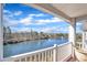 Breathtaking lake view from private balcony with white railing at 10421 Rosegate Ct # 303, Raleigh, NC 27617