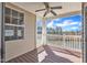 Screened porch showcases picturesque views of the lake and surrounding greenery at 10421 Rosegate Ct # 303, Raleigh, NC 27617
