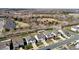 Street view of well-maintained homes with manicured lawns and a beautifully landscaped median at 1055 Kerr St, Burlington, NC 27215