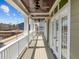 Covered balcony featuring detailed ceiling and white columns at 1086 Tender Dr, Apex, NC 27502