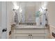 Half bathroom vanity featuring granite countertops and stylish fixtures at 1086 Tender Dr, Apex, NC 27502