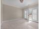 Empty bedroom with access to private balcony at 1086 Tender Dr, Apex, NC 27502